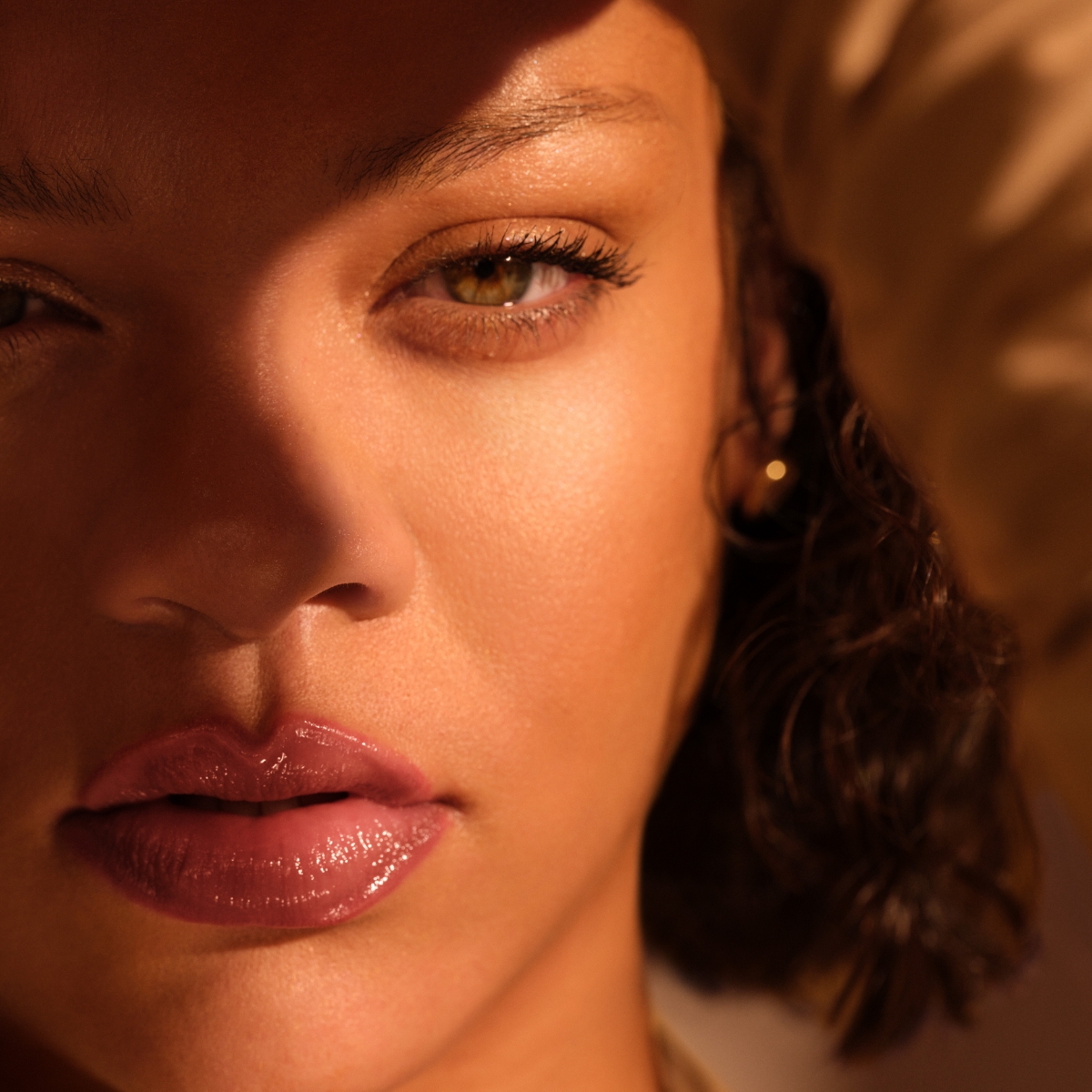 Fenty Beauty image ad — Be Radiant, Not Greasy
